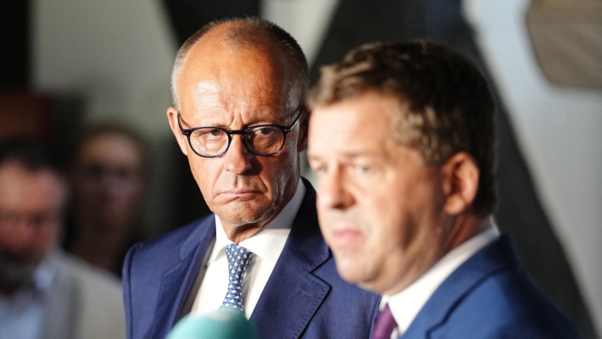 Friedrich Merz und Sven Schulze | Kay Nietfeld/dpa
