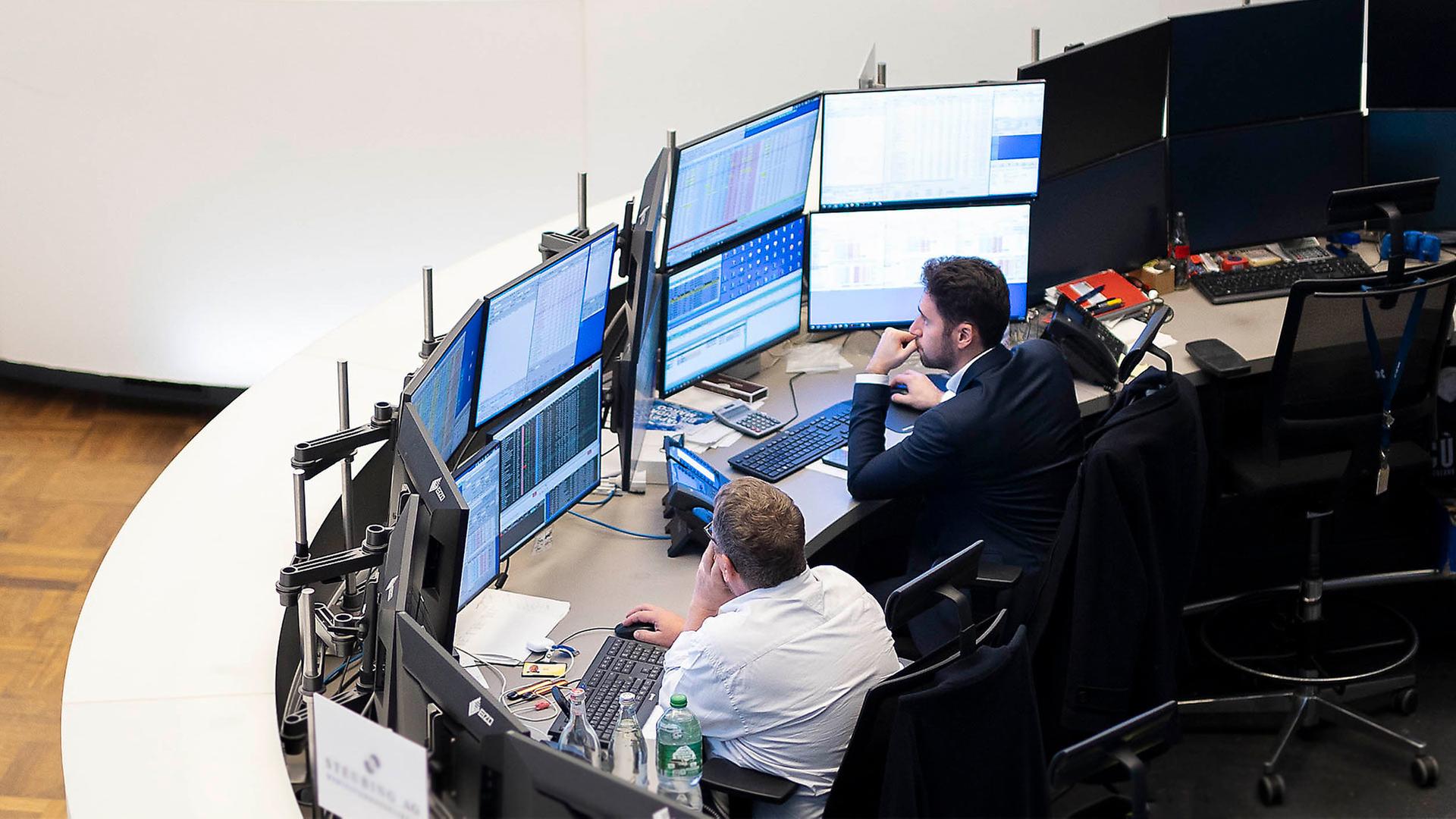 Händler an der Frankfurter Börse. | picture alliance / photothek.de