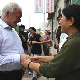  Alois Rainer und Qin Aiteng
