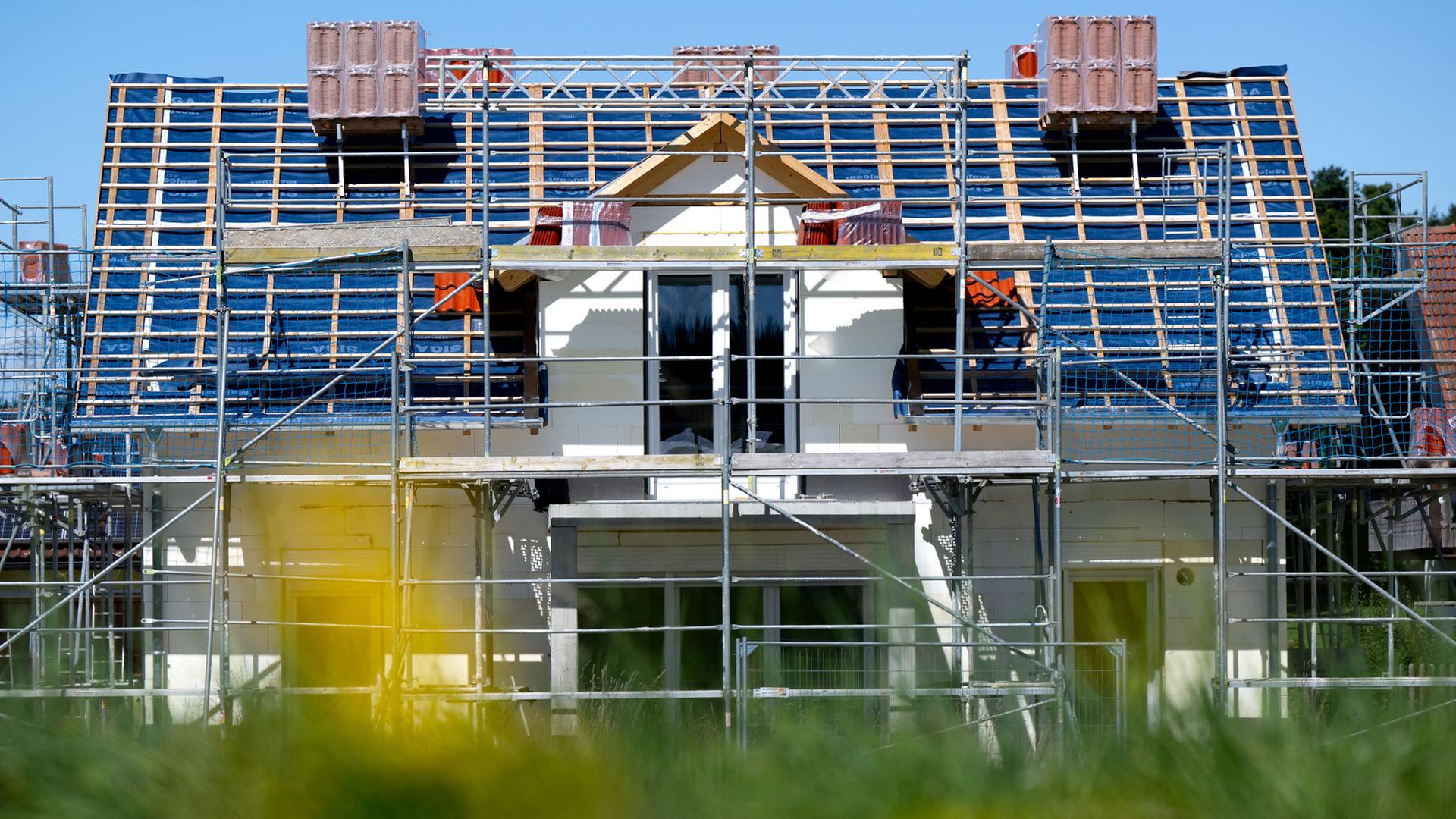 Neubau eines Einfamilienhauses. | picture alliance/dpa