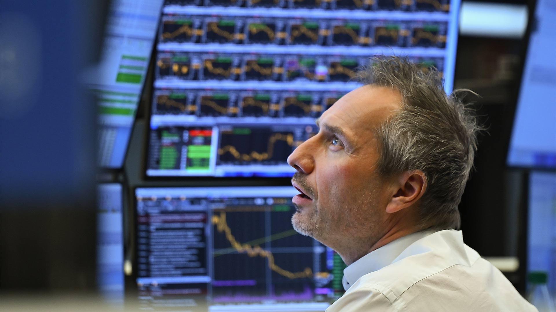 Börsenhändler an der Frankfurter Börse. | picture alliance/dpa