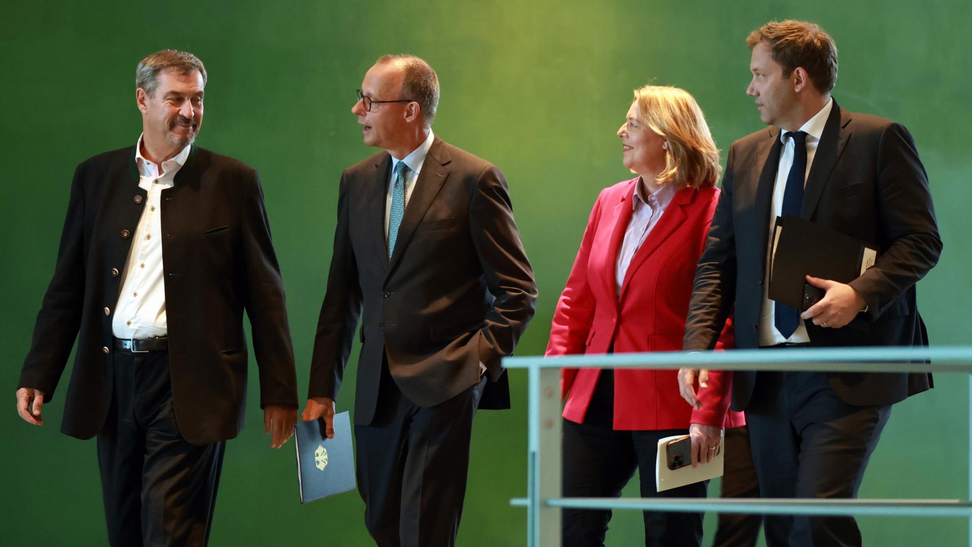  Markus Soeder, Friedrich Merz, Baerbel Bas und Lars Klingbeil  | EPA