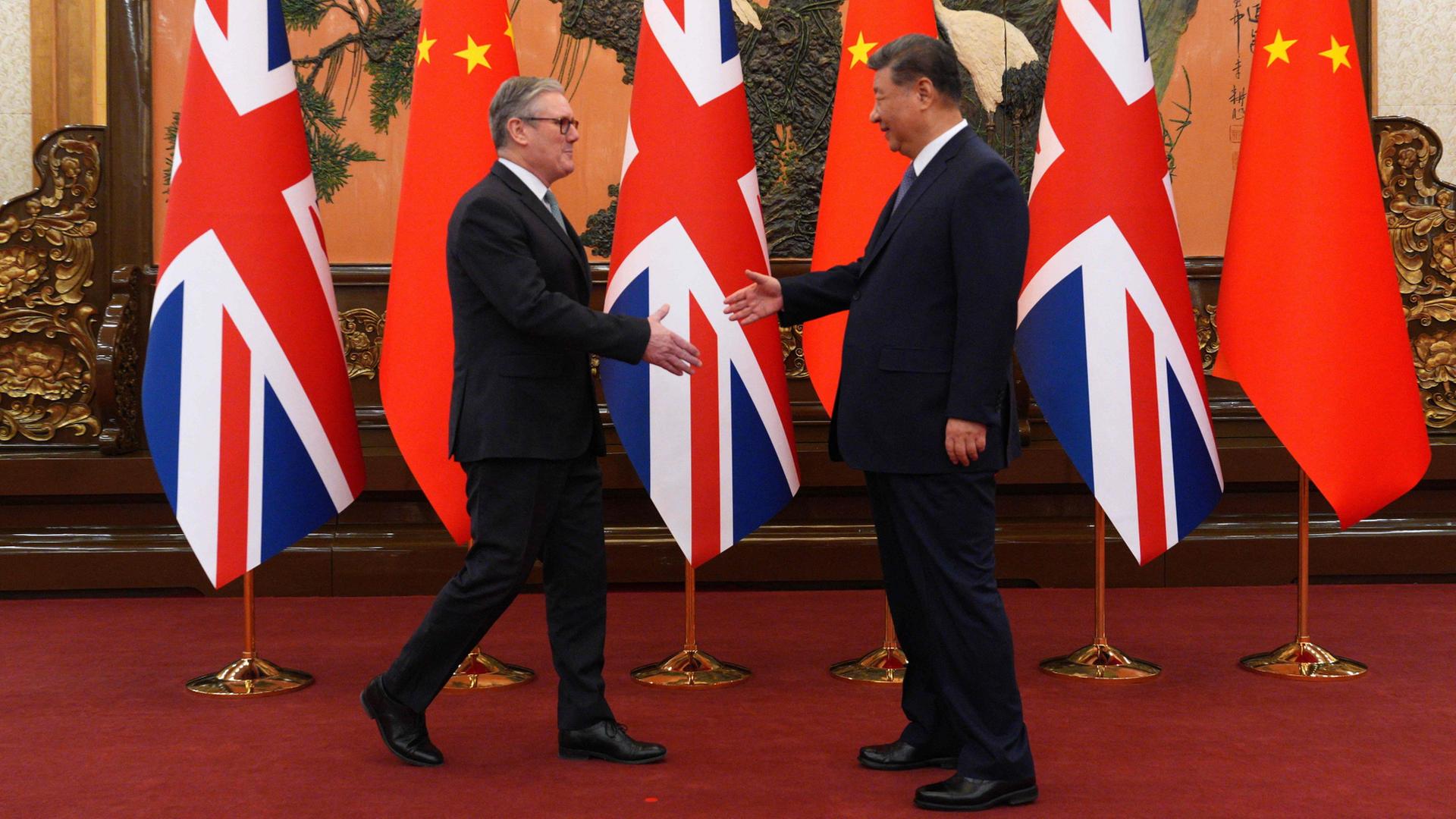 Keir Starmer und Xi Jinping | AFP