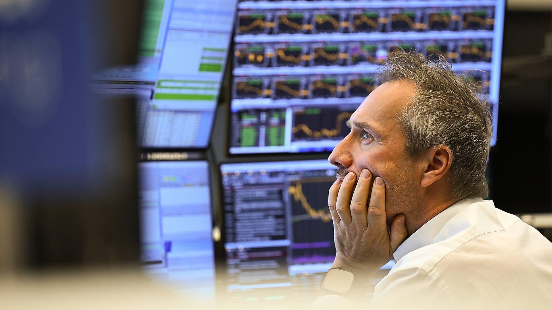 Börsenhändler an der Frankfurter Börse. | picture alliance/dpa
