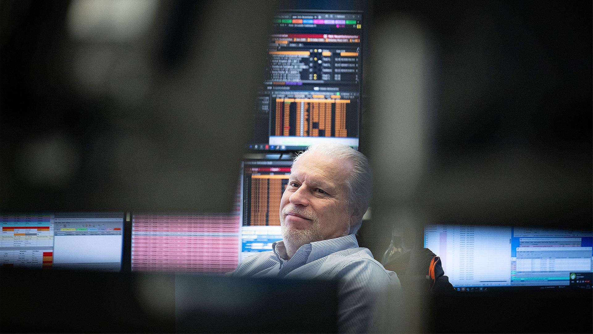 Händler an der Frankfurter Börse. | picture alliance/dpa