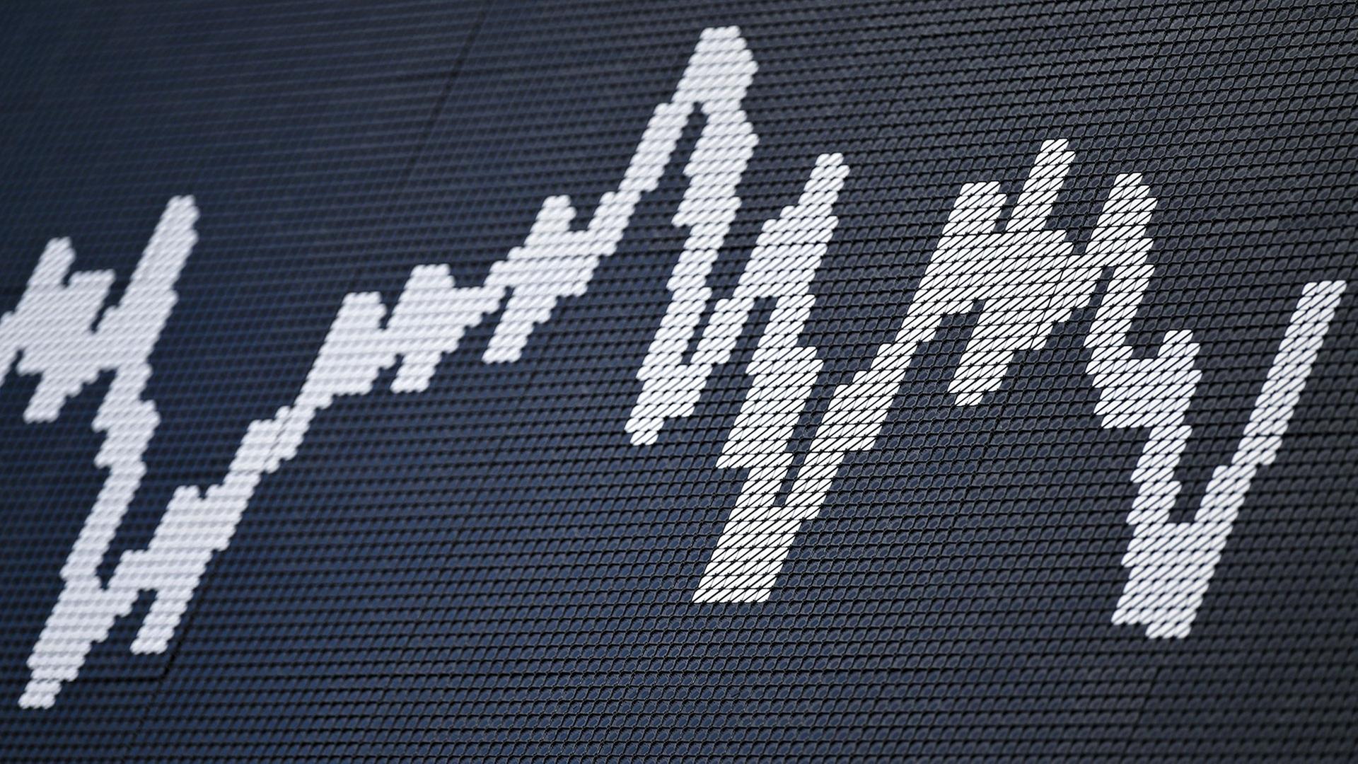 Dax-Kurve im Handelssaal der Frankfurter Börse | picture alliance/dpa