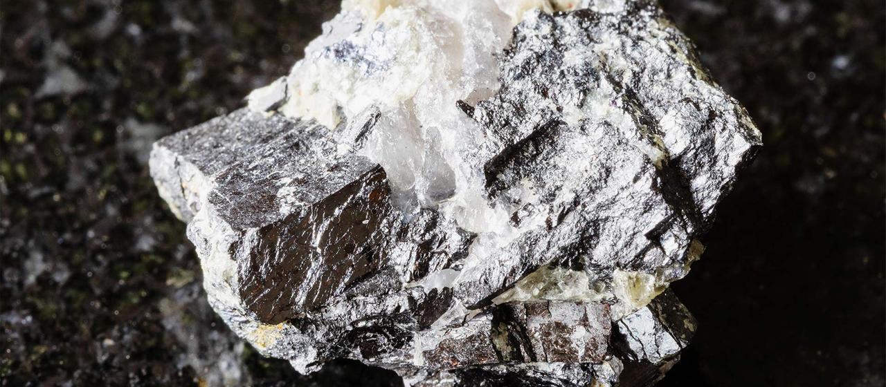 Sample of a raw wolframite mineral.