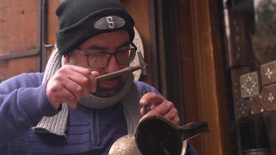 Syrischer Handwerker bei der Arbeit