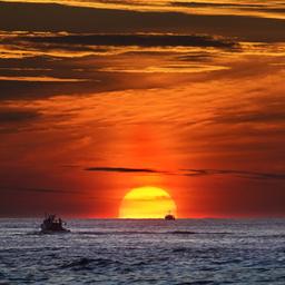 Ein Sonnenuntergang an der Küste vor dem US-Bundesstaat Maine (Archivbild).