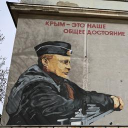 Die Aufschrift einer Hauswand in Simferopol.