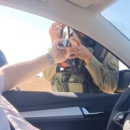 Soldiers threaten the ARD team sitting in a car in the West Bank