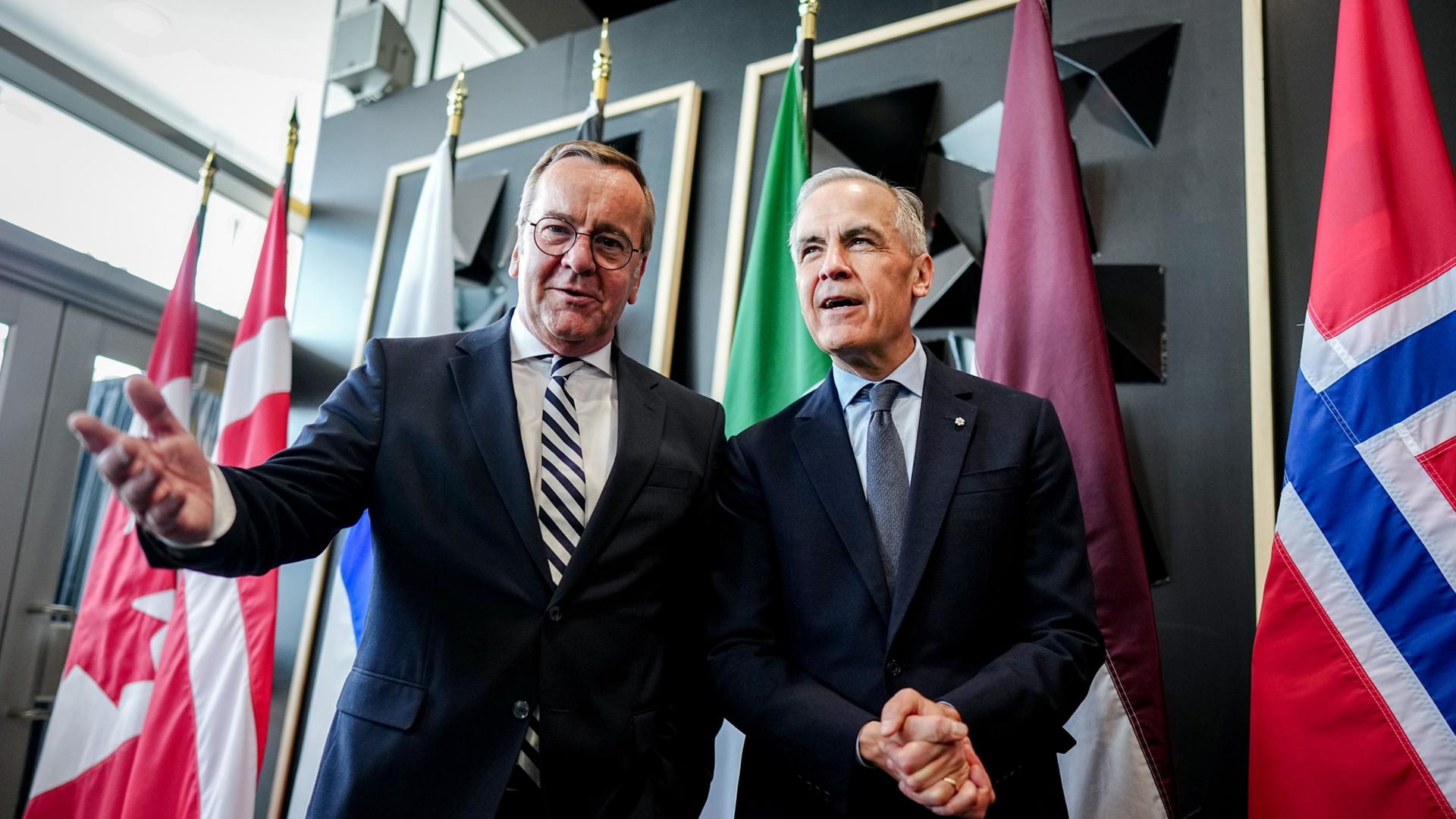 Boris Pistorius und Mark Carney | Kay Nietfeld/dpa