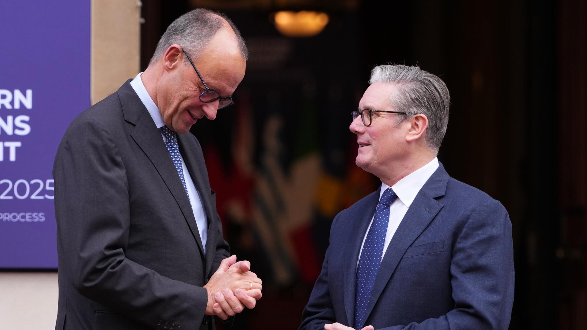 Friedrich Merz und Keir Starmer | dpa