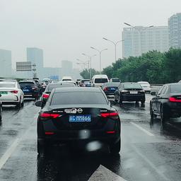 Straßenverkehr in Peking