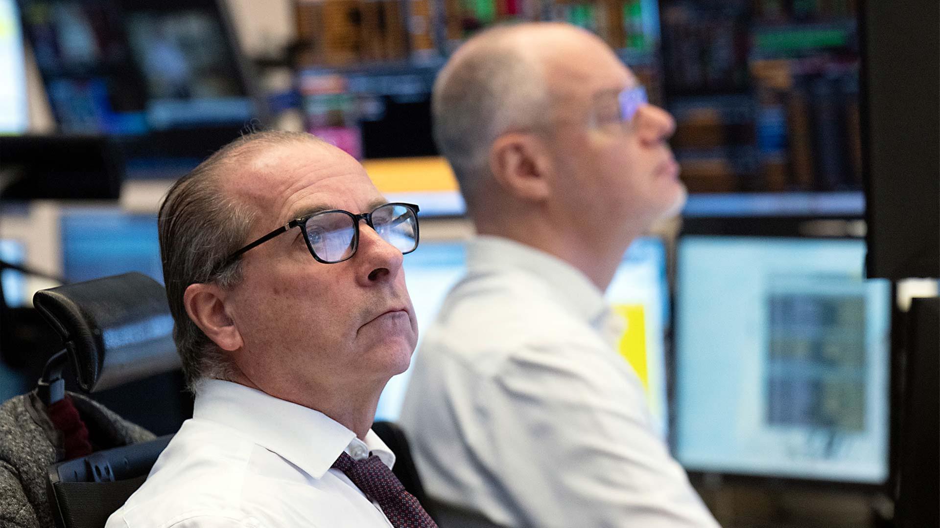 Börsenhändler an der Frankfurter Börse. | picture alliance/dpa