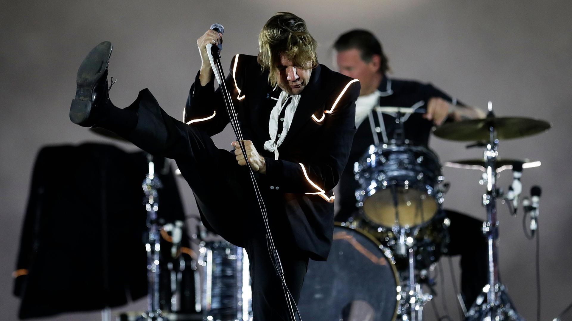 "The Hives" bei Rock in Rio, durchsichtiger Fernsehbildschirm auf der IFA in Berlin, Nonnen in Indien