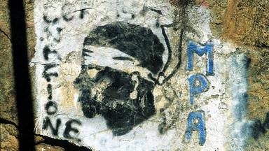Graffito eines Widerstandskämpfers an einer Mauer in Corte auf Korsika.