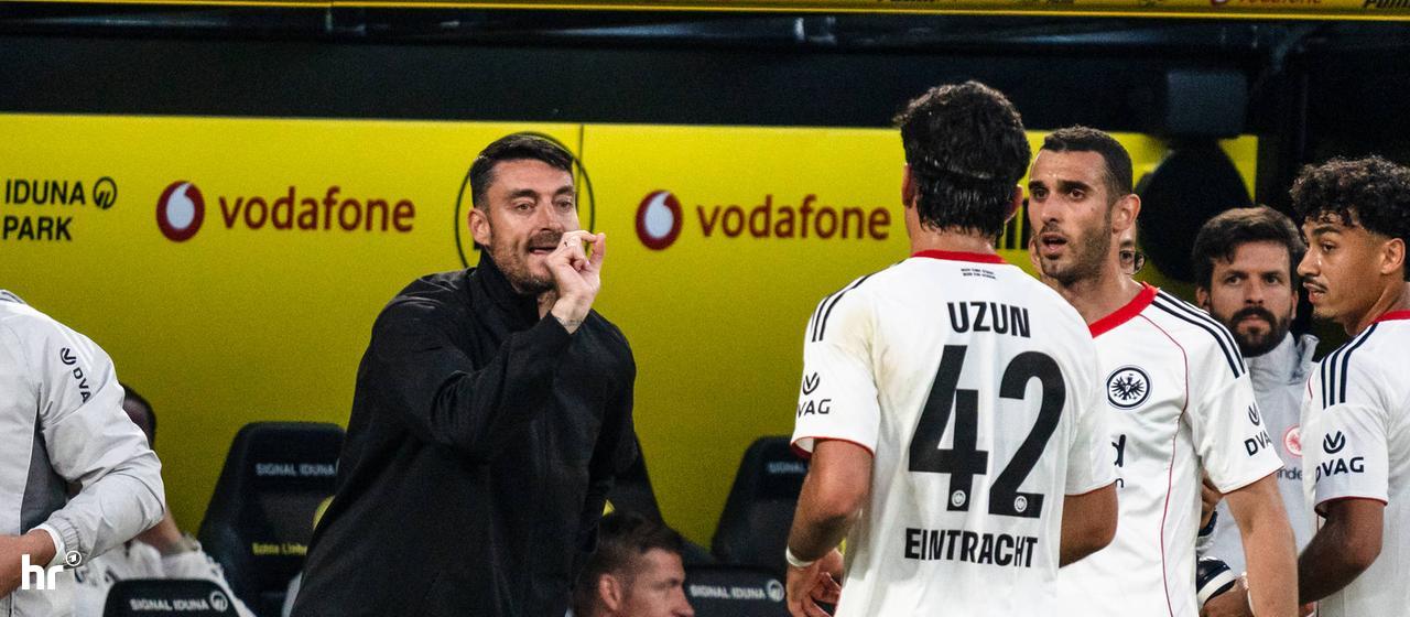 Eintracht-trainer Albert Riera and playmaker Can Uzun.