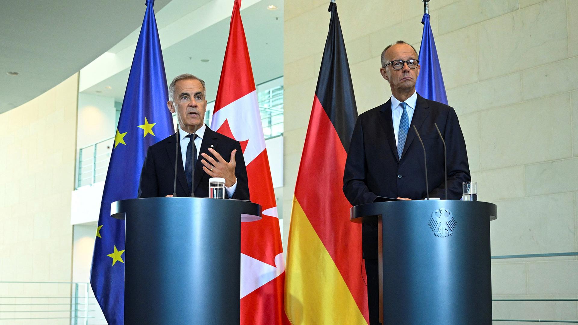 Mark Carney, Friedrich Merz | REUTERS