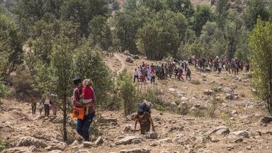 Flüchtende Jesiden aus dem Irak auf dem Weg in die Türkei (Archivbild vom 20.08.2014).