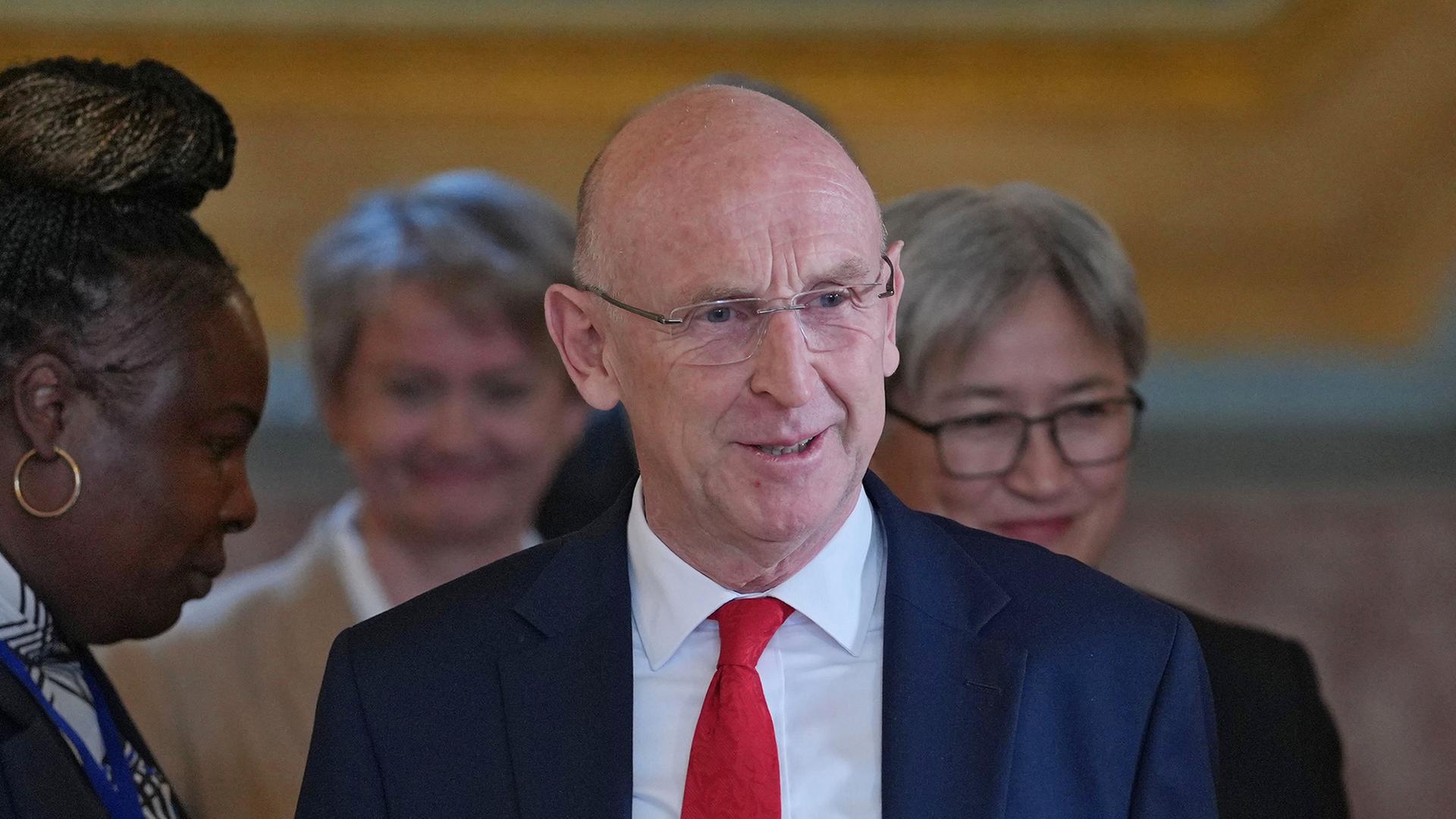 John Healey | AP Photo/Kin Cheung