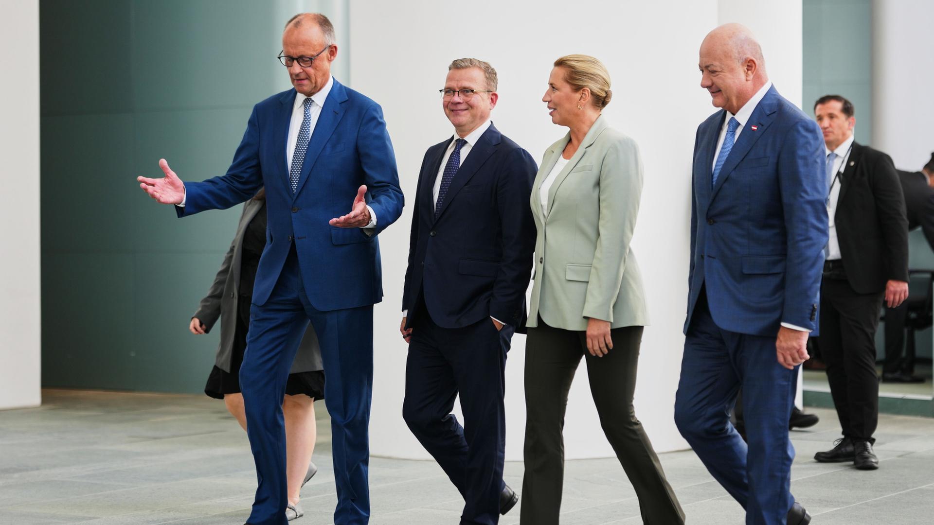 Friedrich Merz, Petteri Orpo, Mette Frederiksen und Christian Stocker | AP Photo/Markus Schreiber