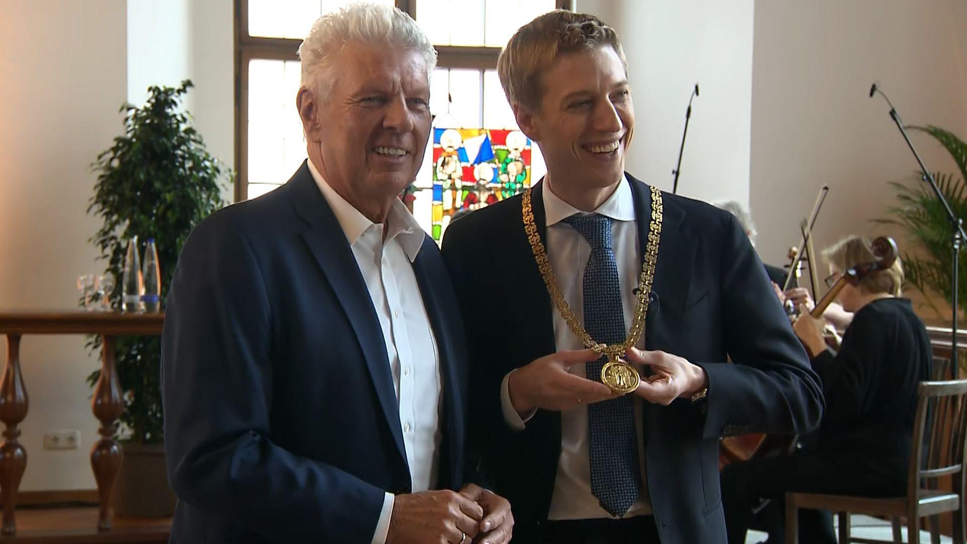 Alt-Oberbürgermeister Dieter Reiter (SPD) und Nachfolger Dominik Krause (Grüne) | BR