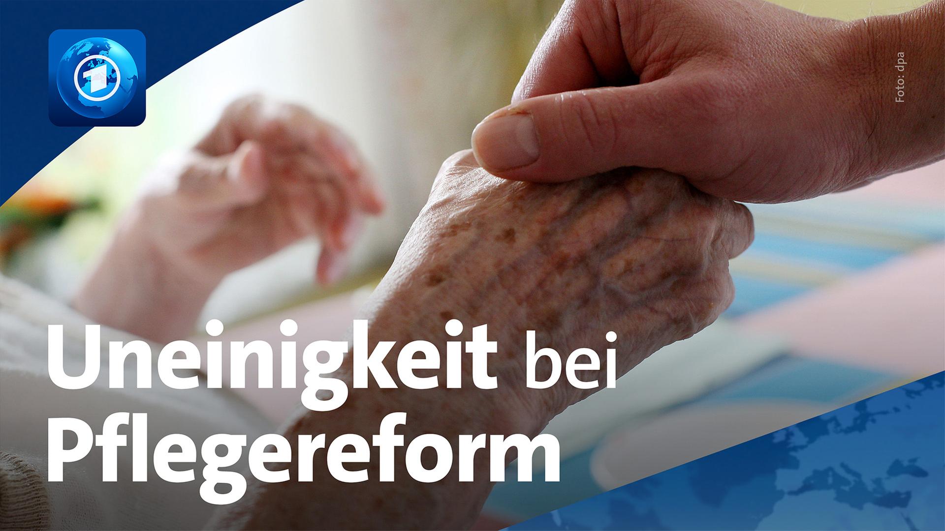 Eine jÃ¼ngere Hand hÃ¤lt sanft die Hand einer Ã¤lteren Person. | dpa/ARD-aktuell
