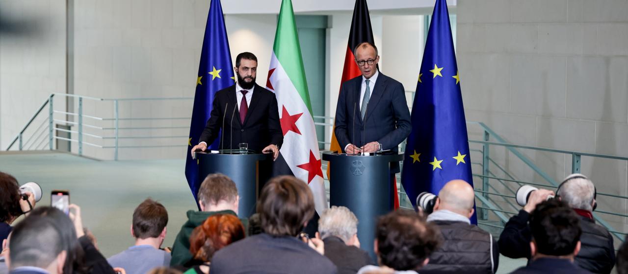 Al-Scharaa und Merz bei ihrem Auftritt vor der Presse