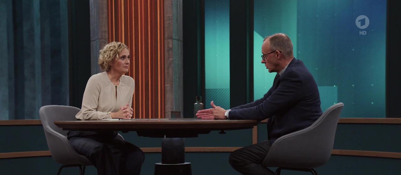 screenshot Miosga und Merz am Tisch