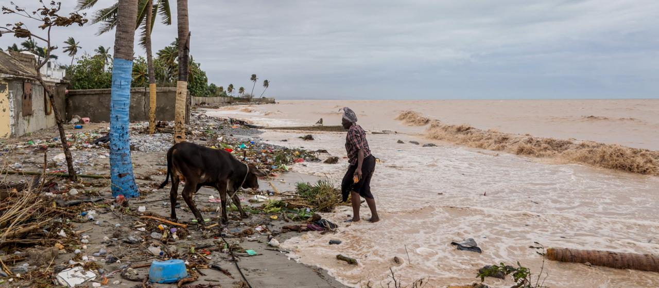 A woman in the flooded town of Les Cayes in Haiti.
