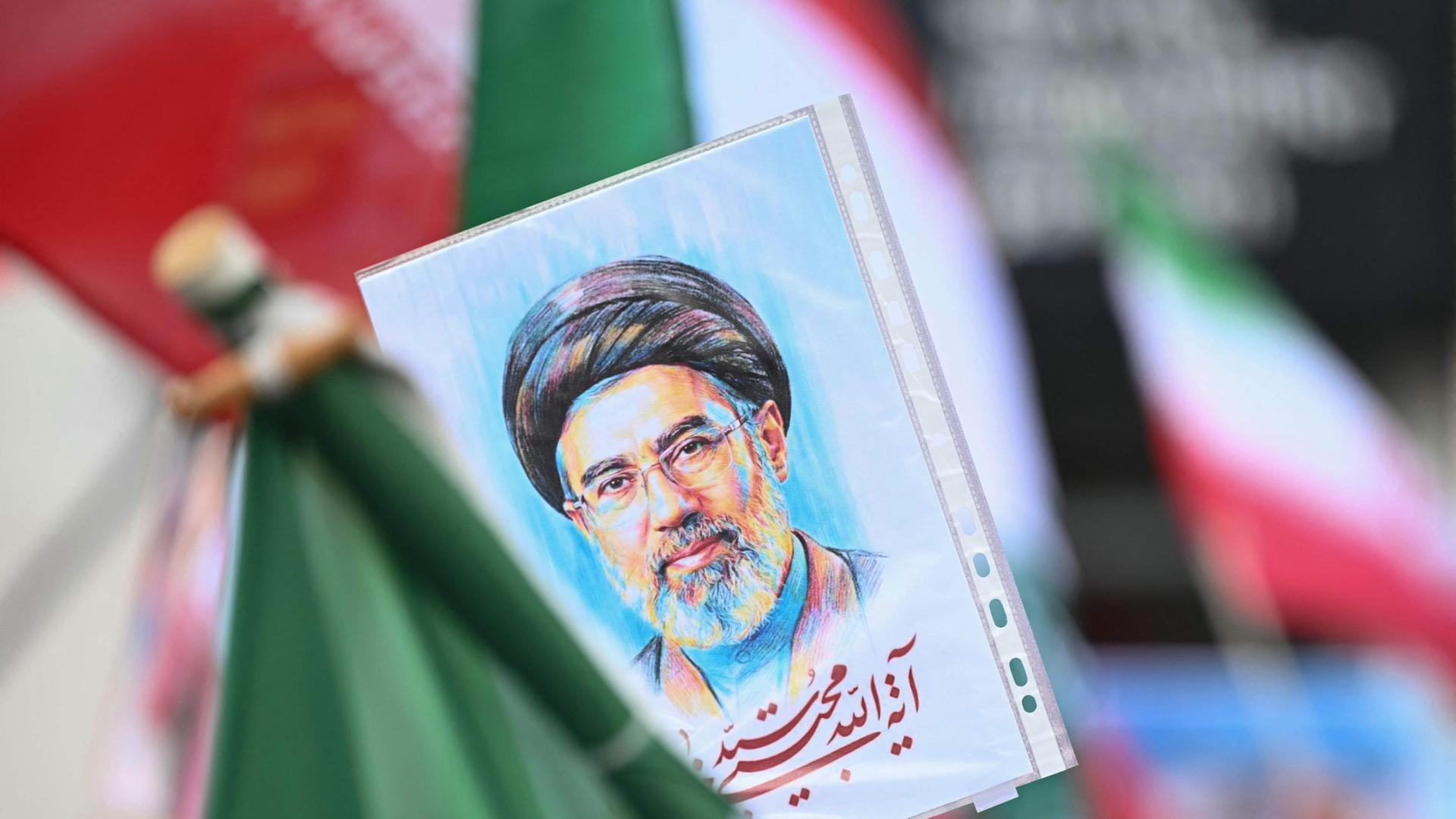 Eine Zeichnung stellt Modschtaba Chamenei dar. | AFP