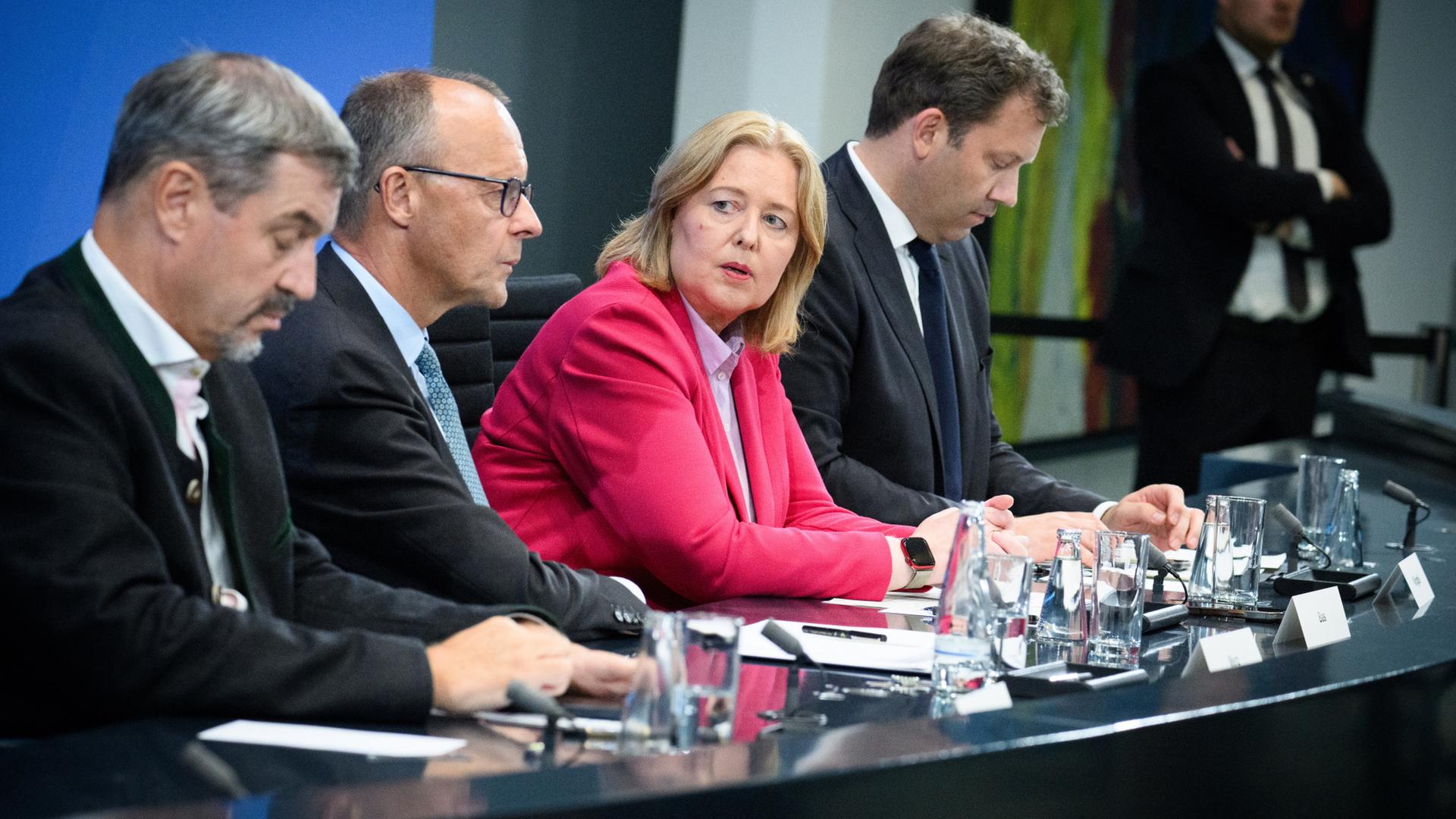 Markus Sder, Friedrich Merz, Brbel Bas und Lars Klingbeil | dpa