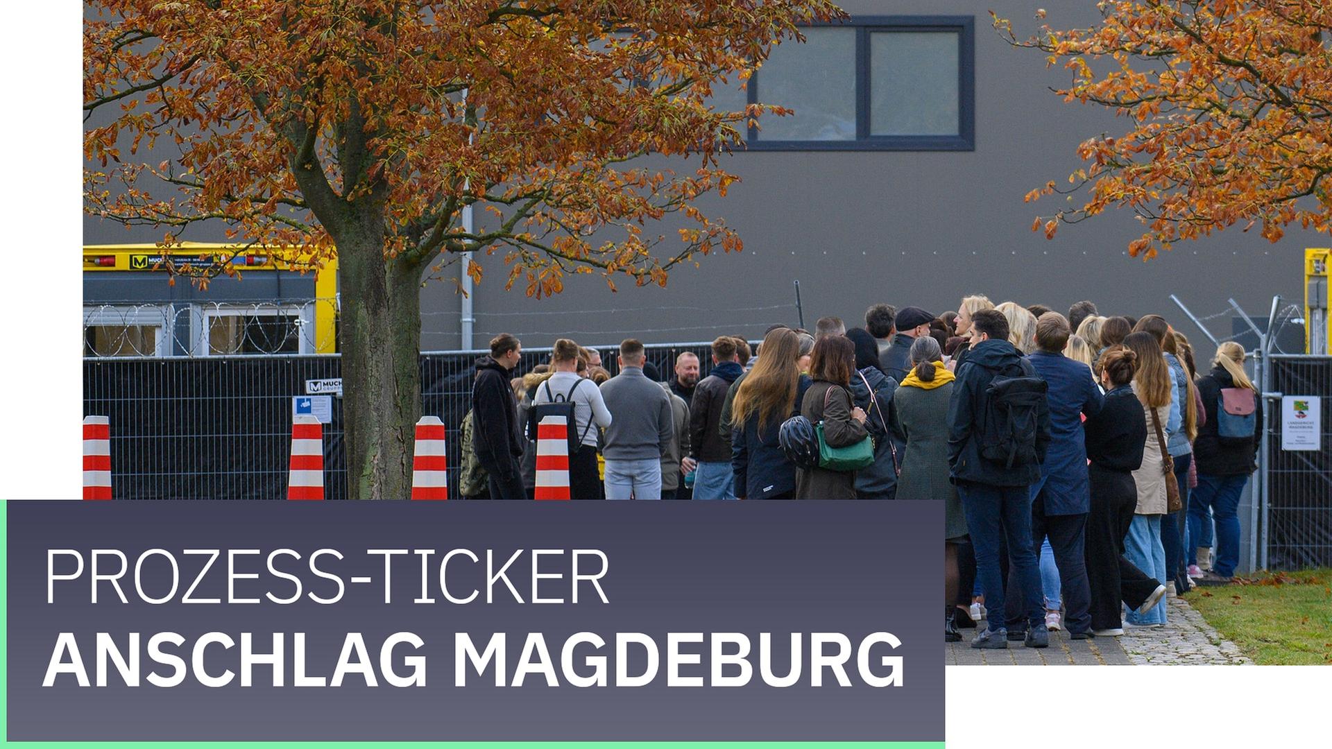 Menschen stehen in einer Reihe vor dem Interims-Gerichtsgebäude vom Landgericht Magdeburg. | picture alliance/dpa | Klaus-Dietmar Gabbert