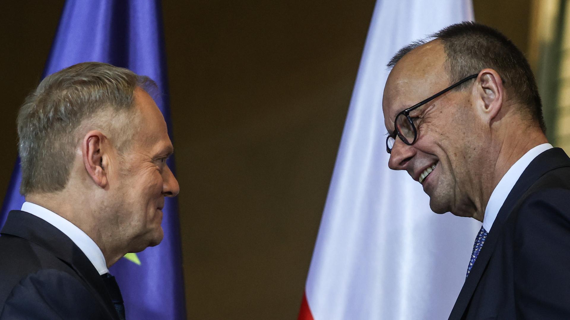 Donald Tusk (links) und Friedrich Merz | EPA