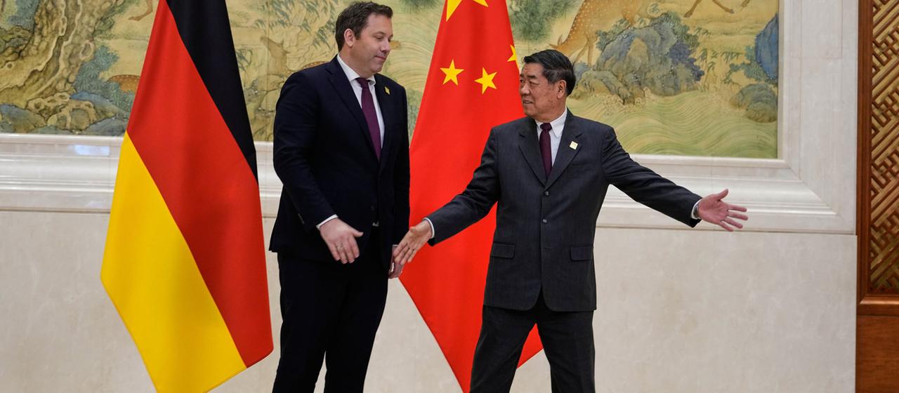 Lars Klingbeil und He Lifeng