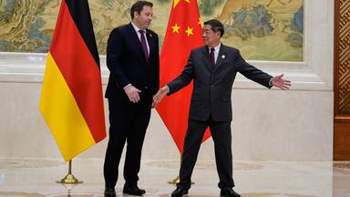Lars Klingbeil und He Lifeng