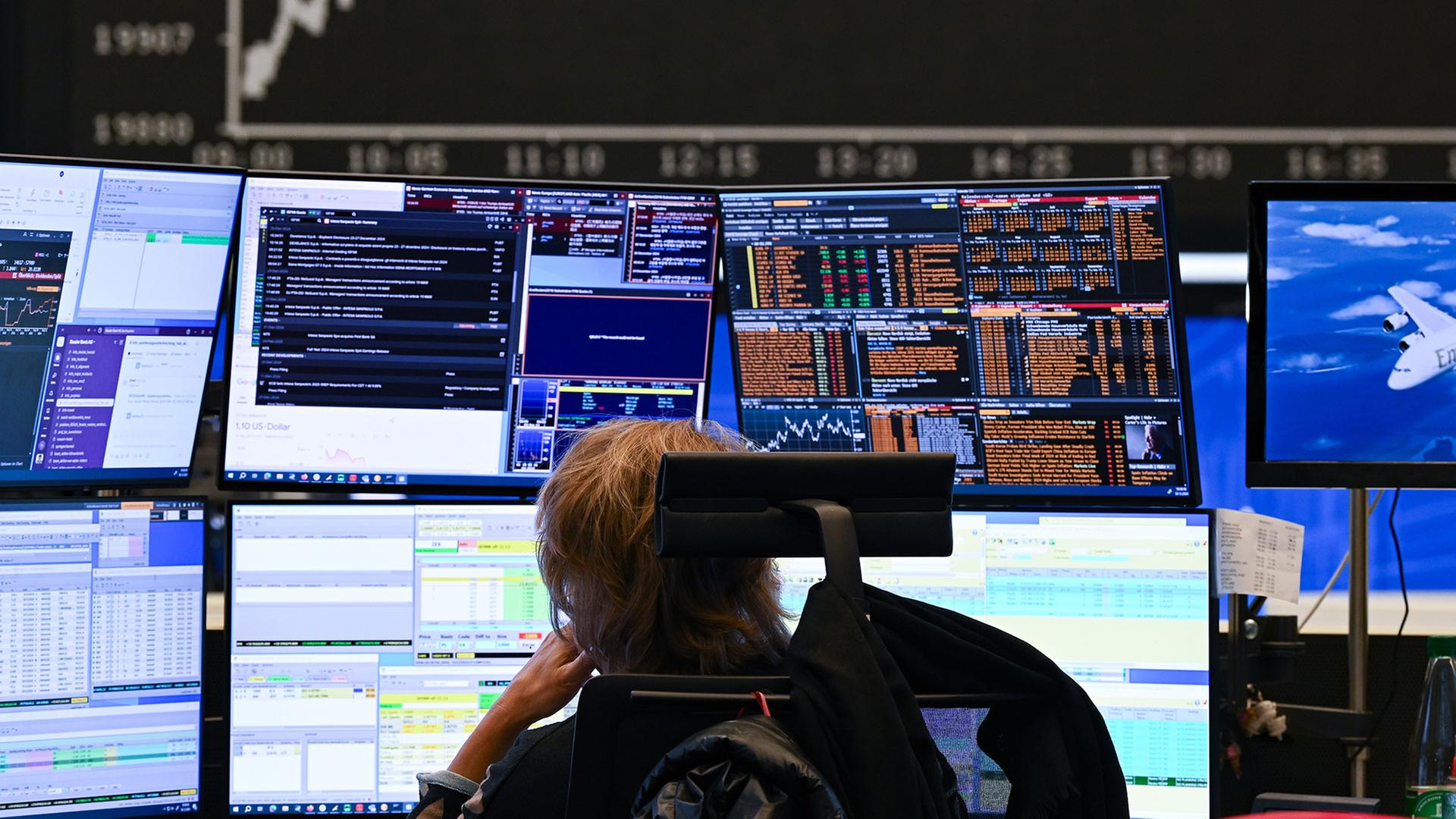 Händlerin an der Frankfurter Börse. | picture alliance/dpa