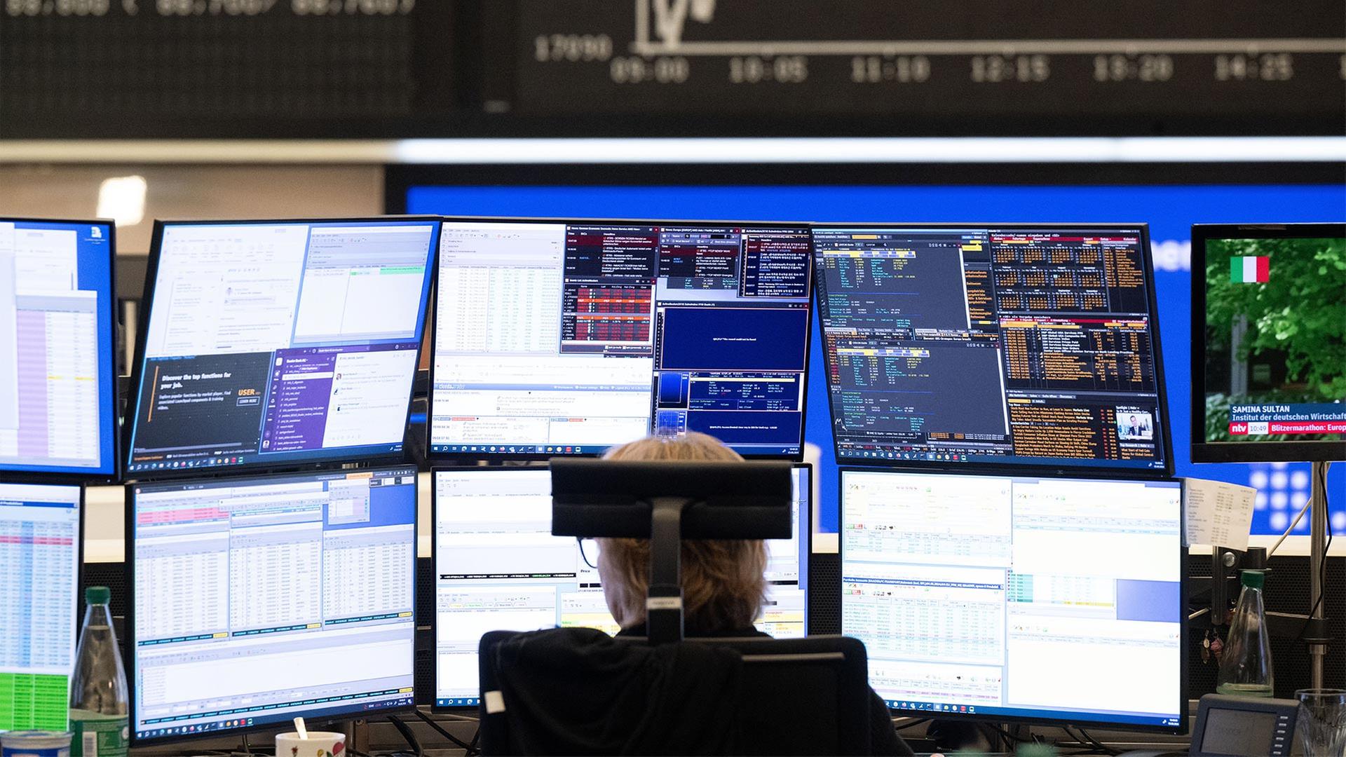 Händler an der Frankfurter Börse. | picture alliance/dpa