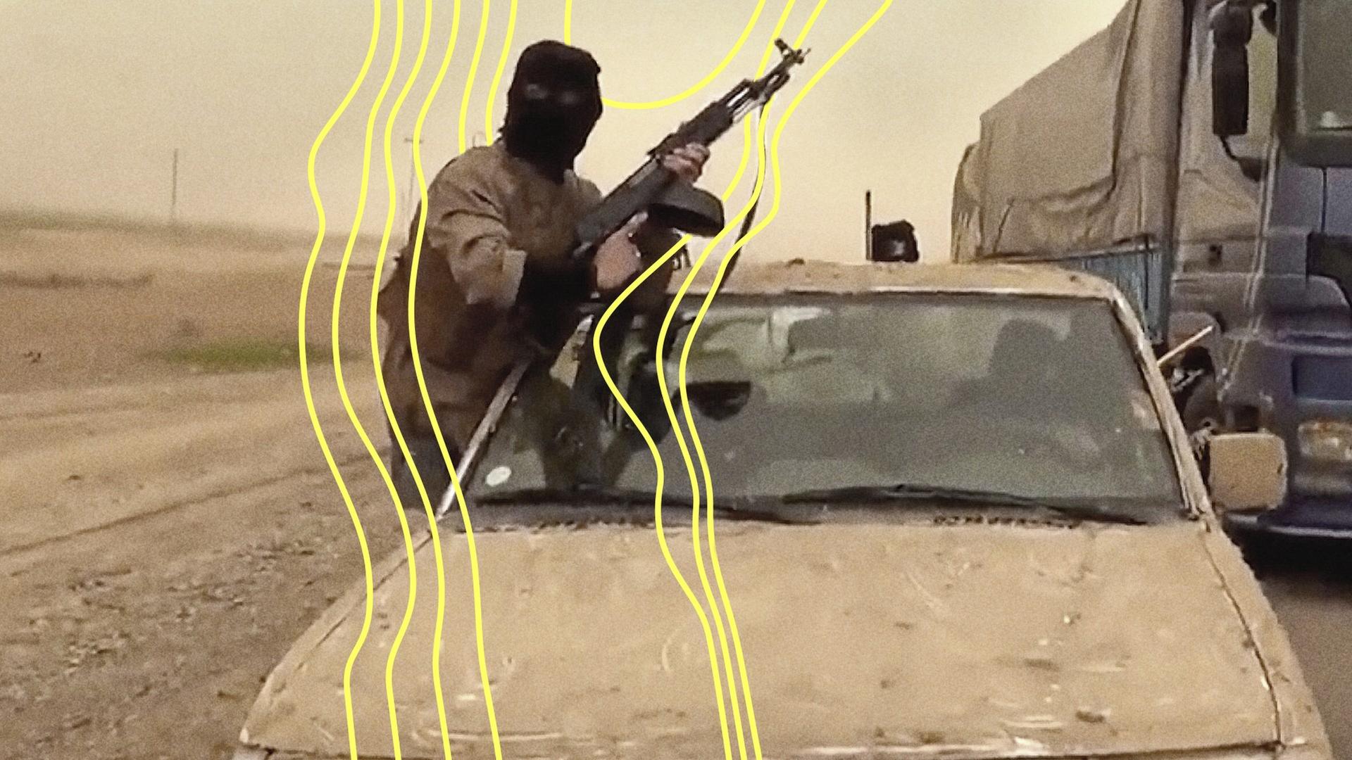 Ein maskierter Islamist mit einem Gewehr. | NDR