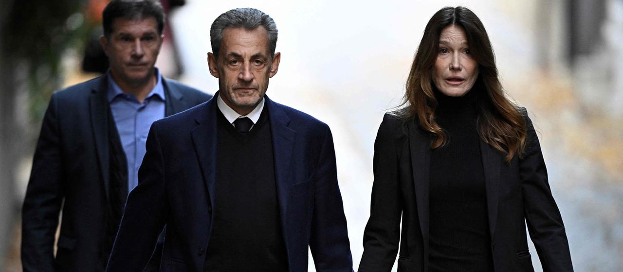 Nicolas Sarkozy und Carla Bruni-Sarkozy | AFP Nicolas Sarkozy und Carla Bruni-Sarkozy