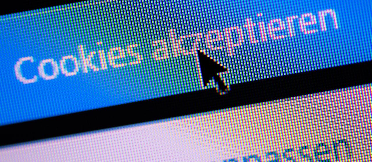 Ein Mauszeiger an einem Button mit der Aufschrift "Cookies akzeptieren"