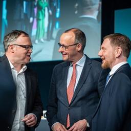 Mario Voigt, Friedrich Merz und Michael Kretschmer auf einer Programmkonferenz der CDU
