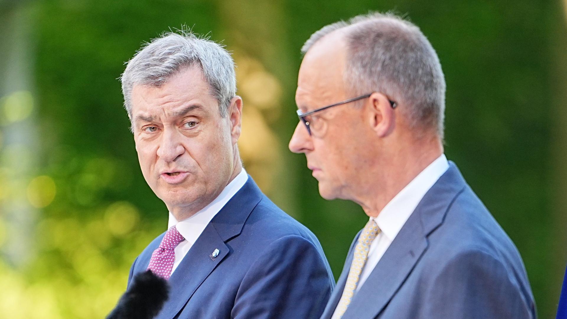 Markus Söder und Friedrich Merz | Michael Kappeler/dpa