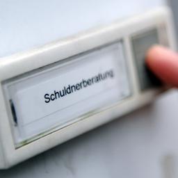 Klingelknopf mit der Aufschrift "Schuldnerberatung"