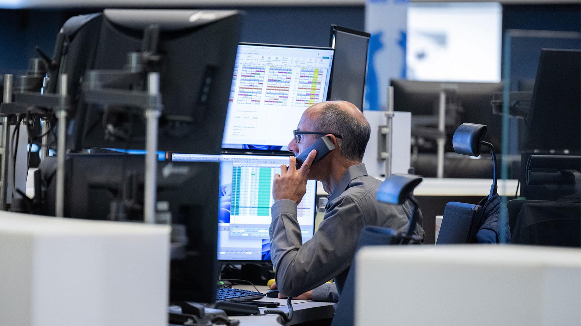 Händler an der Frankfurter Börse. | picture alliance/dpa