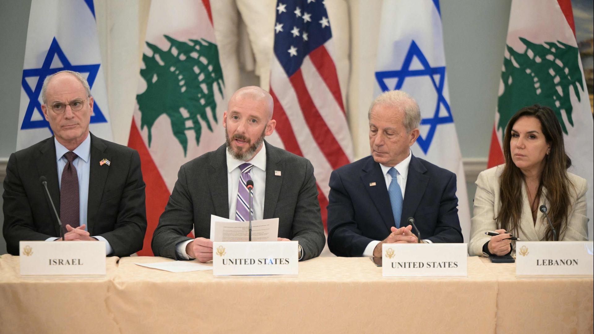 Yechiel Leiter, Daniel Holler, Michel Issa, Nada Hamadeh (v.l.) | AFP