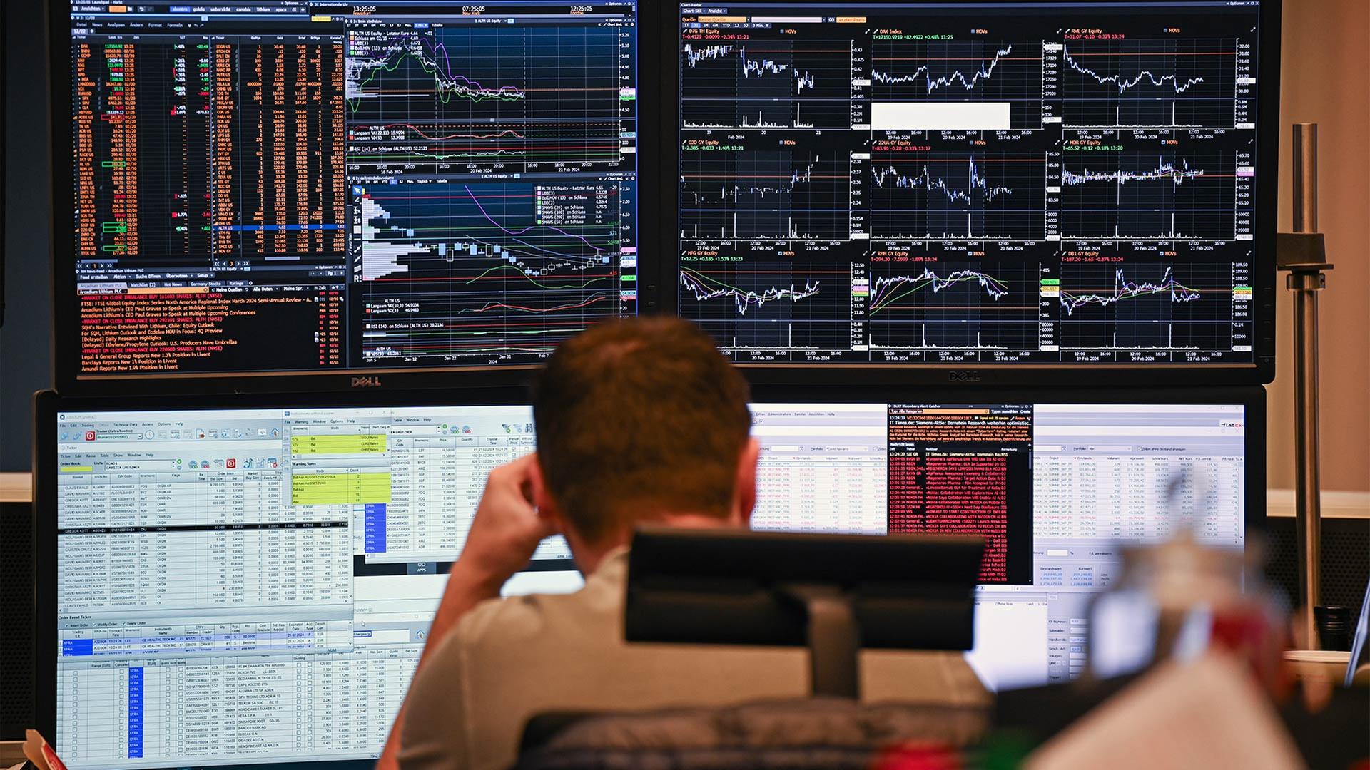 Händler an der Frankfurter Börse. | picture alliance/dpa