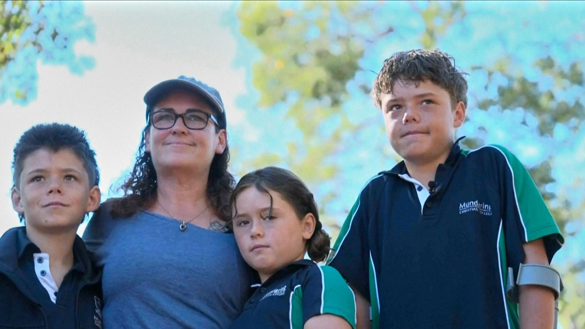 Austin Applebee mit seiner Mutter und seinen beiden Geschwistern | AP