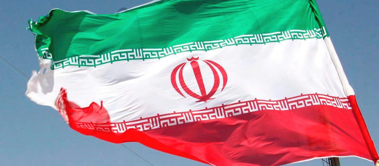 The flag of Iran blows in the wind.